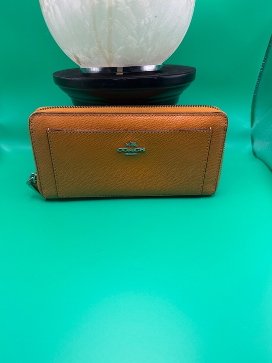 Coach Handbags - Coach Pebbled Leather Zip Wallet in Burnt Orange